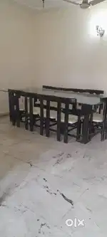Antique ten seater Glass top dinning table
