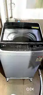 A LG'S top load fully automatic washing machine with stand of nice qul