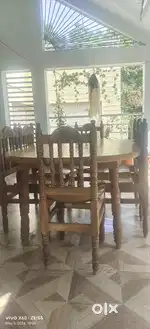 Wooden dining table with 6 chairs