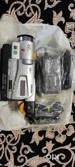 Sony handycam with charger,audio video cable,box,5 video cassette free