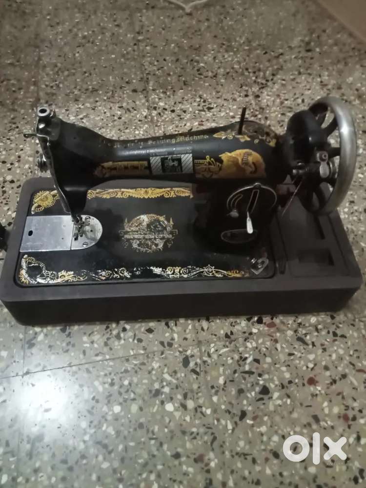 Sewing machine with motor and juicer-mixer