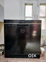 Dishwasher whirlpool 8 plate 2 year old