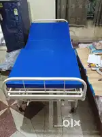 Fowler bed (both side adjustable with side railing)