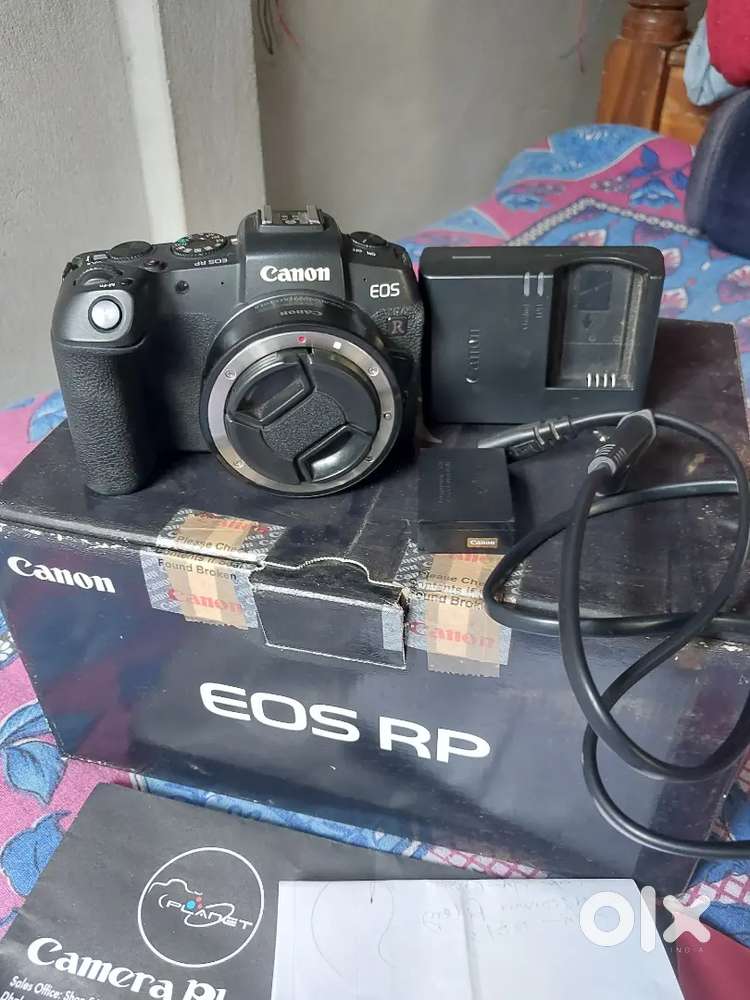 Can on RP full front camera? No lens only bodyAdapter charger battery