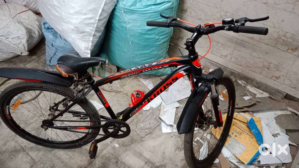 Kross black and neon orange 3 month old 24 inch bicycle
