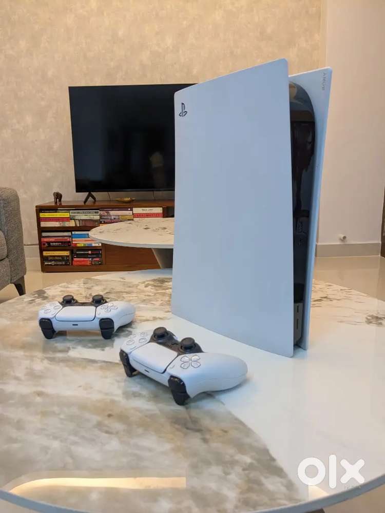 PS5 console with 2 controllers , God of War Ragnarock bundle
