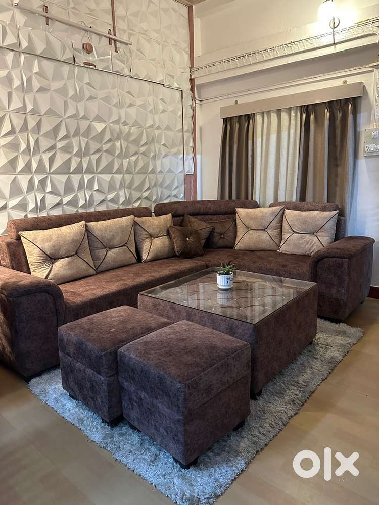 L shaped 6 seater sofa with center table and 2 stool