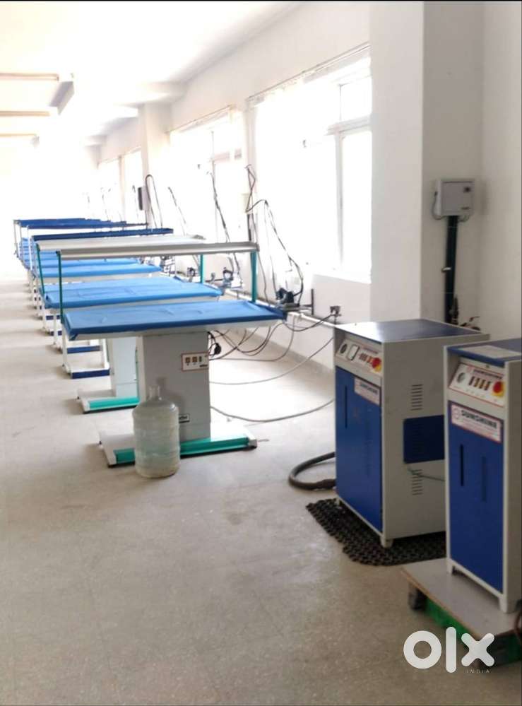 Steam iron tables , boilers , checking tables, hangers,