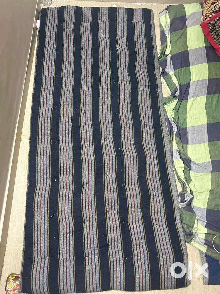 2 beds for sleeping/ resting with pillows