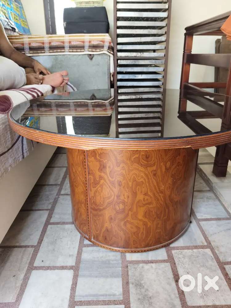 A glass top round table polished