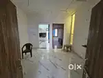 One room and one kichin and two bath room and one Hall