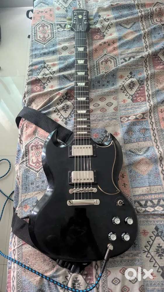 Electric Guitar - Very less used and in mint condition.