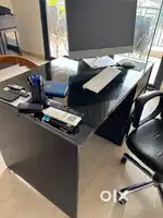Office table and revolving chair