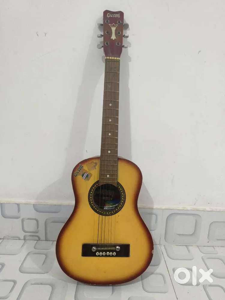 Guitar, Medium size ,Wooden with decent condition