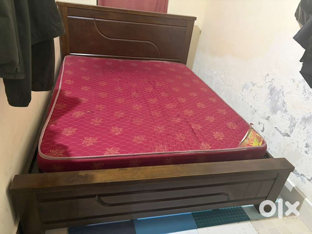 Wooden double bed with cot