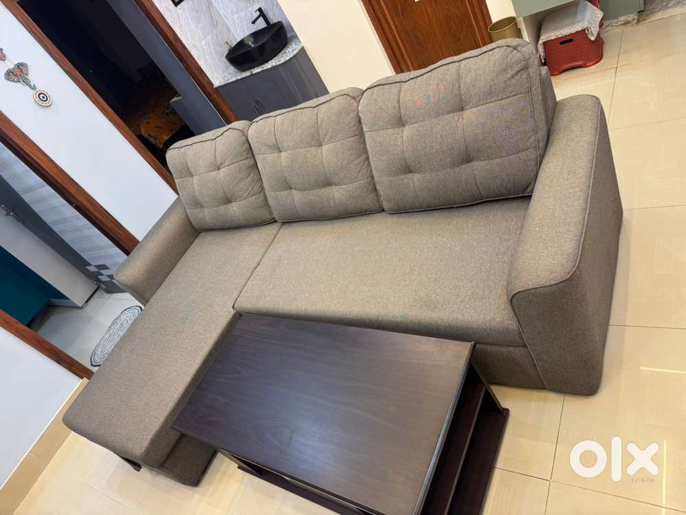 Damro L Shape Sofa Cum Bed with Priyestra Centre Table