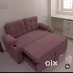 2 seater sofa comebed with attached pillow and beautiful colour