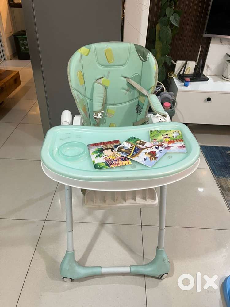 High Chair with multiple levels and hardly used