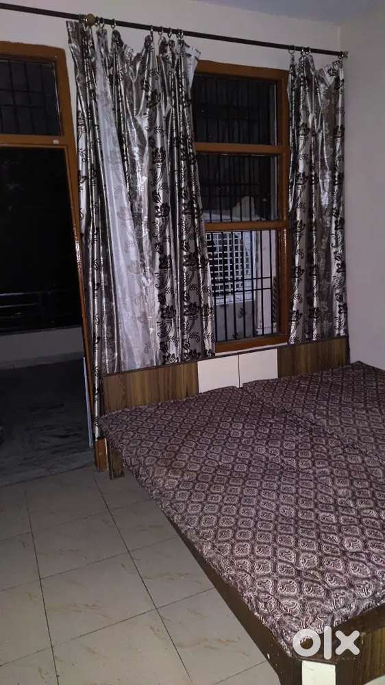 Room with attend bathroom, including bed, fan, Almira, study table,