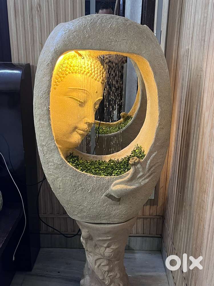 serene Buddha-themed indoor fountain