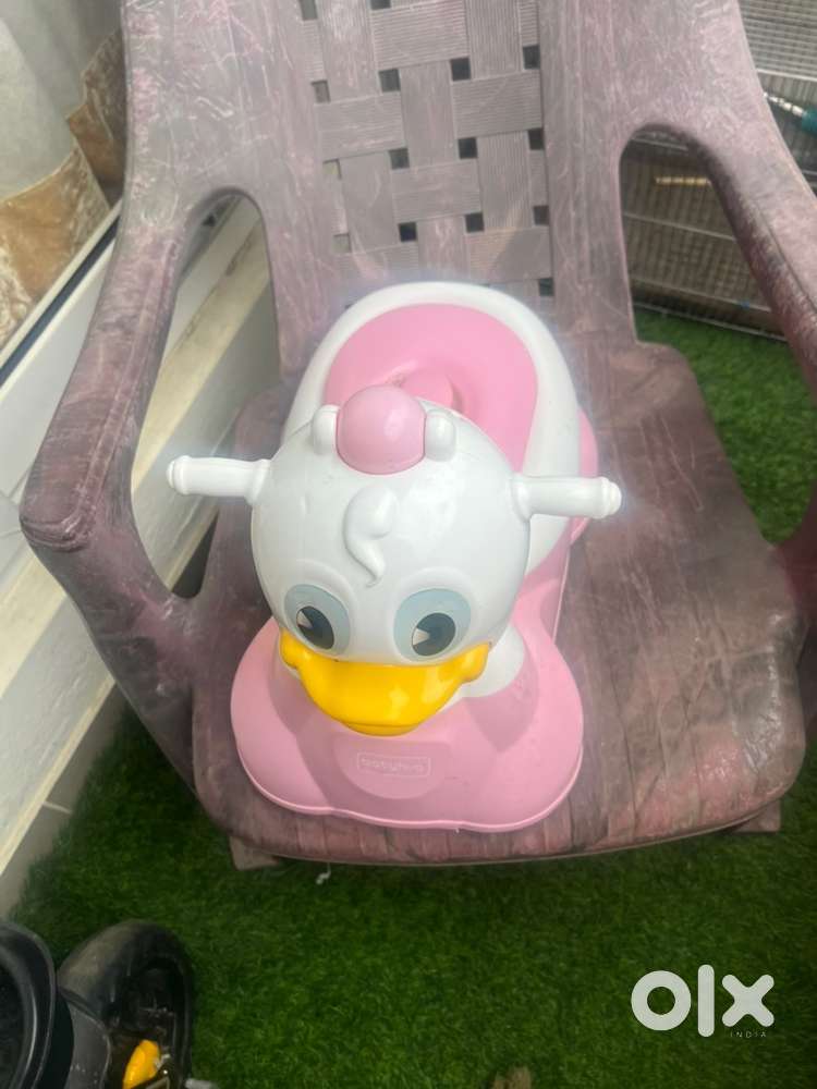 Potty training seat with music