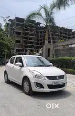 Maruti Suzuki Swift LXI Optional-O, 2017, Petrol