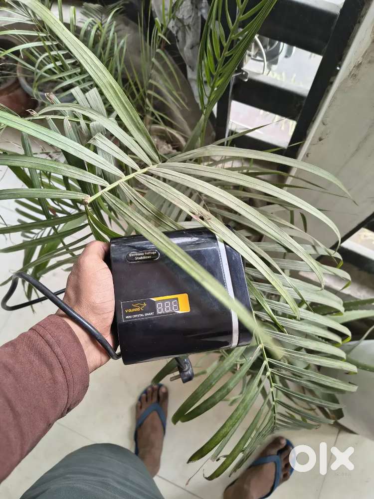 V-Guard Mini Crystal Smart Voltage Stabilizer)Price Negotiable