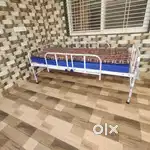 Hospital Bed with Height adjustable arrangement