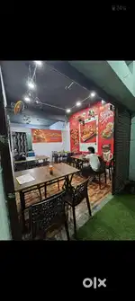 Cafe kitchen appliance all electronic items with table and chairs