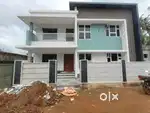 AN AMAZING NEW 4BED ROOM 2000SQ FT 5.5CENT HOUSE IN MANNUTHY,THRISSUR