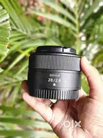 Nikkor Z 28mm /2.8 Box piece lens in Store available Fresh Condition.