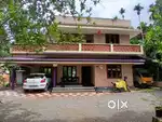 85 cent plot with 1550 sqft house sale at thiruvaniyoor .