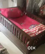 Sturdy baby cot with new mattress