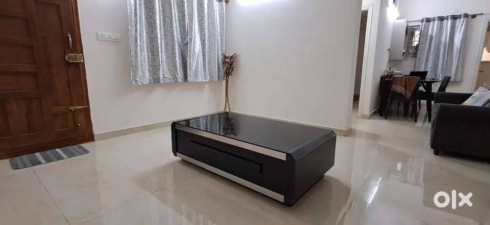 Center coffee Table with thick glass along with storage
