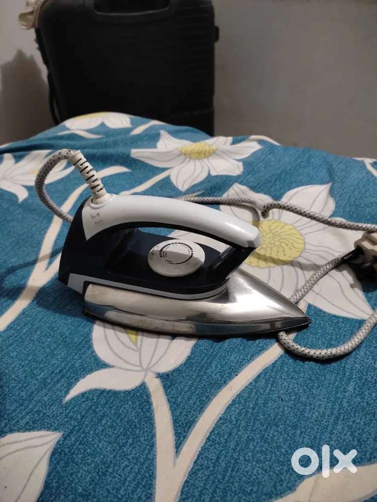 Electric Iron – Fully Working  Strong Heating  ₹300 Only