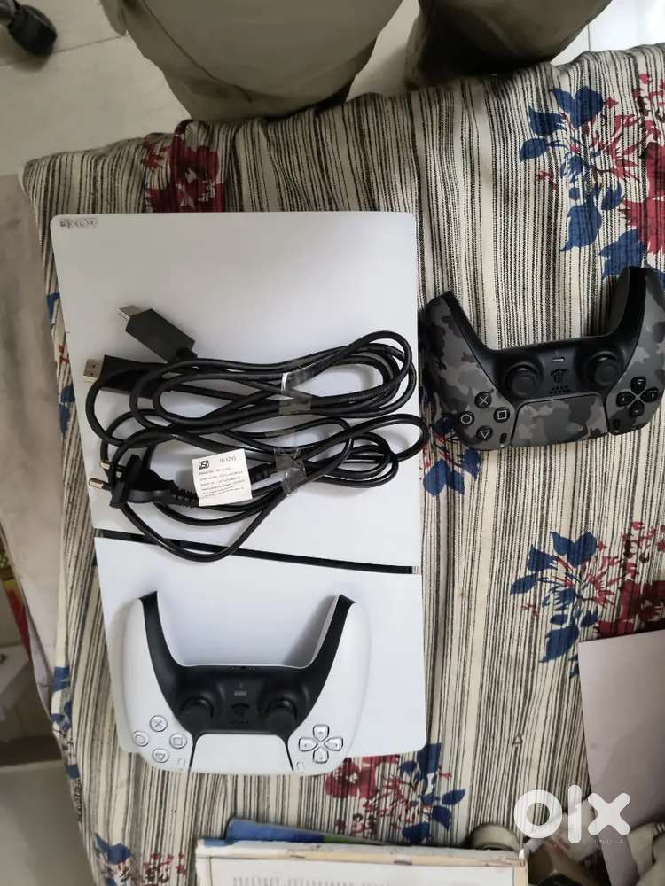 Ps5 slim 1tb with two controllers new condition