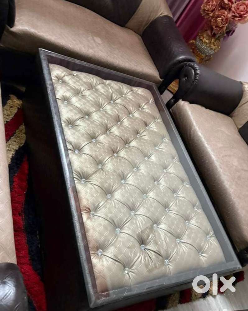 black golden 4 piece sofa set, with a centre table included