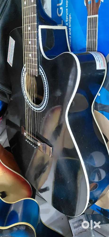 Signature guitar with bag and belt and plectrum