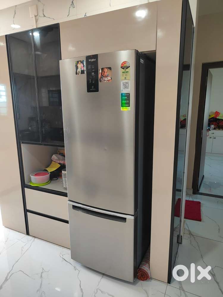 Good condition double door fridge .