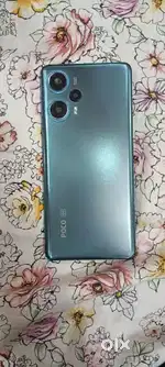 Poco f5 8 gp ram 256 good condition blue colour 18 months old