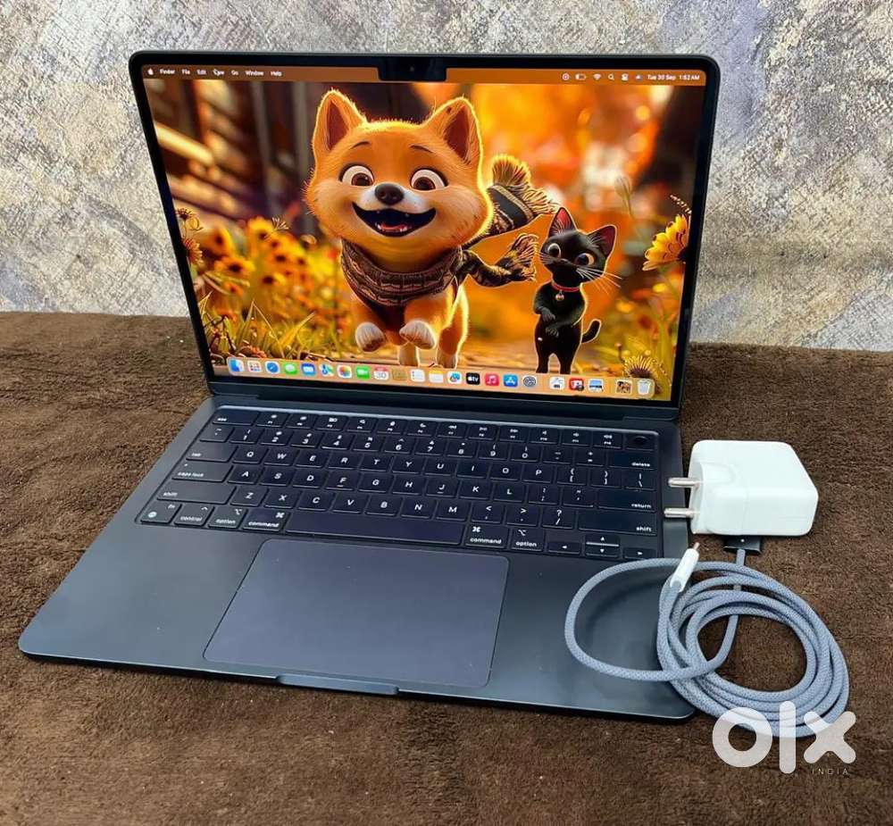 Apple Macbook Air M2 mid night new condition all working
