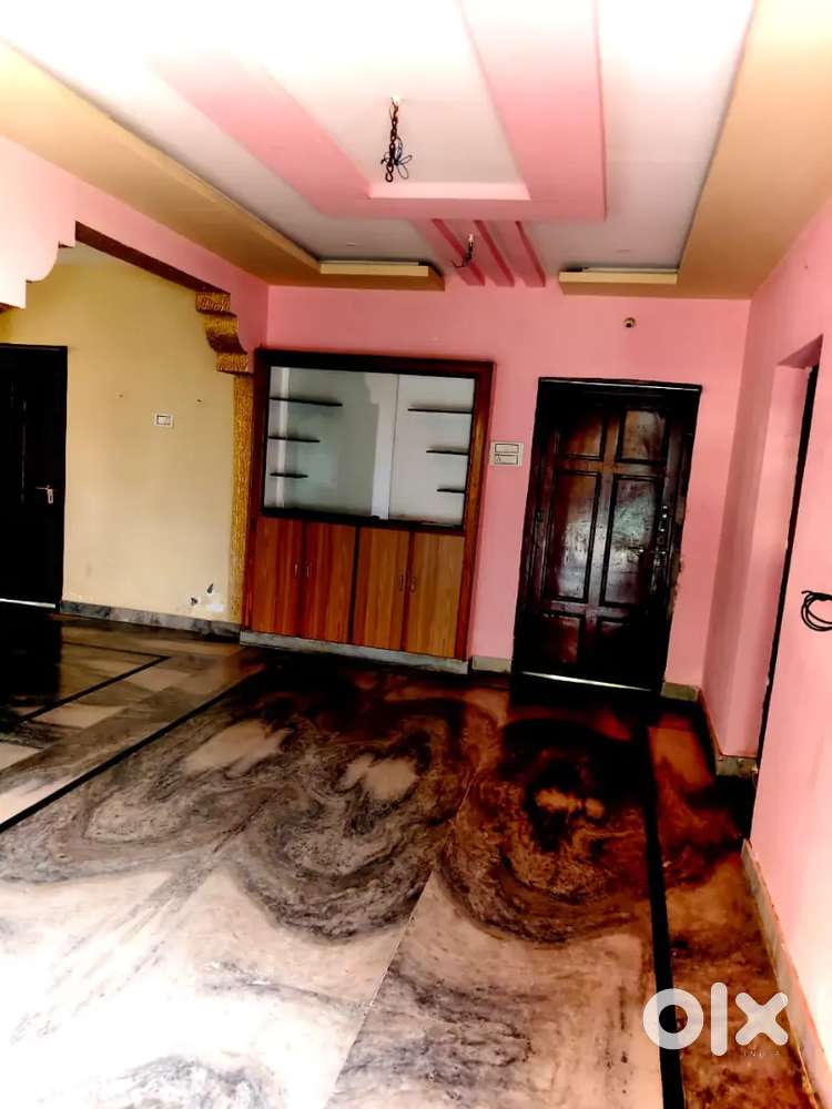 Bommuru East facing 2BHK house with attached bathrooms and cupboards.