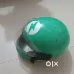 Helmet with green colour.