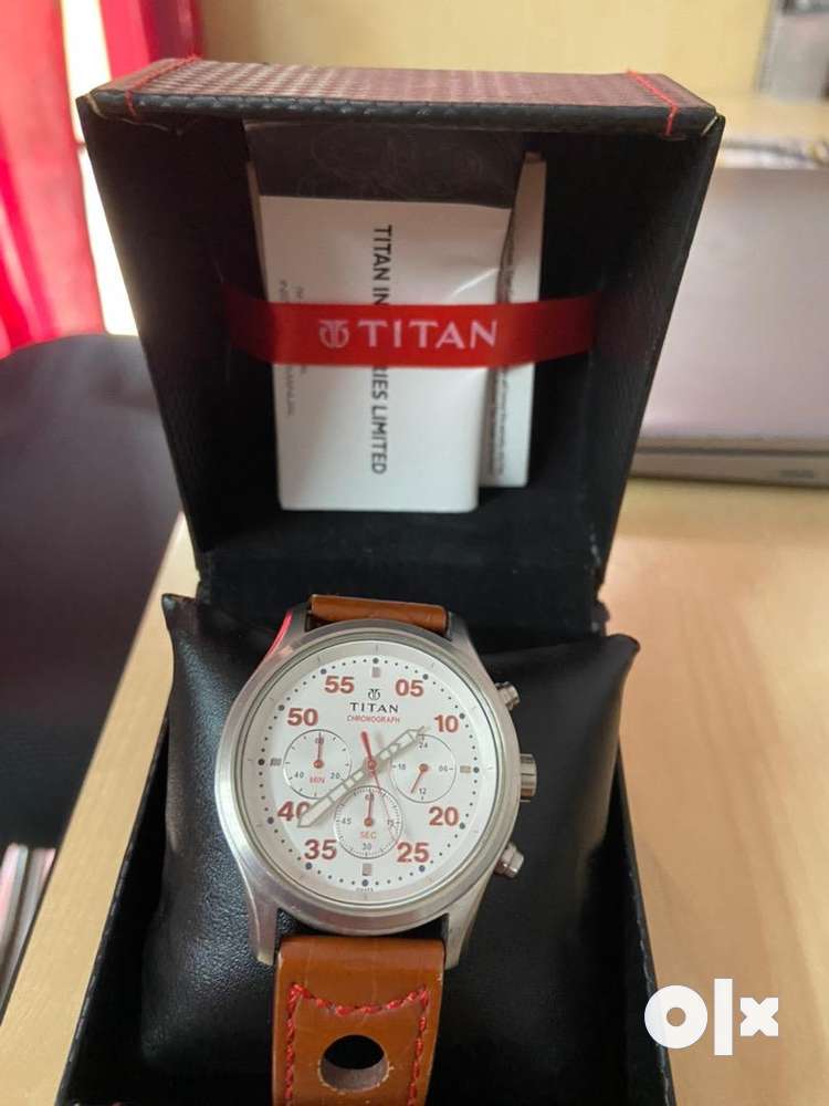 Titan Octane analog white dial watch