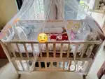 huny huny baby cot Well conditioned hardly used by baby 18 months old.