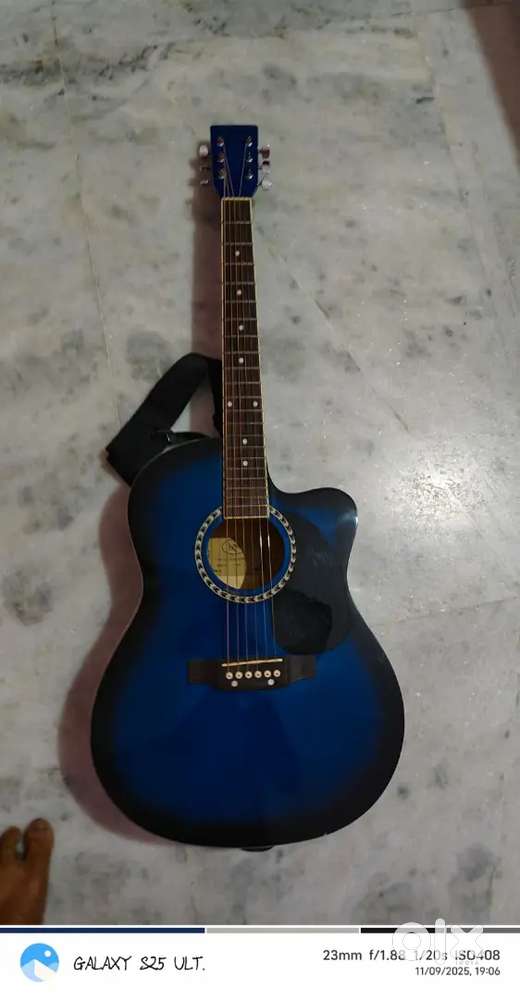 KAPS BRANDED GUITAR WITH PICKUP.