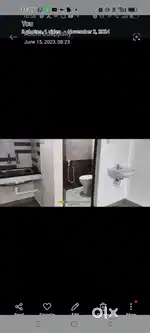 single room with attached bathroom, kitchen, bed at edappally