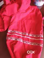 Stylised red dress with hand sewn belt and head accessorie