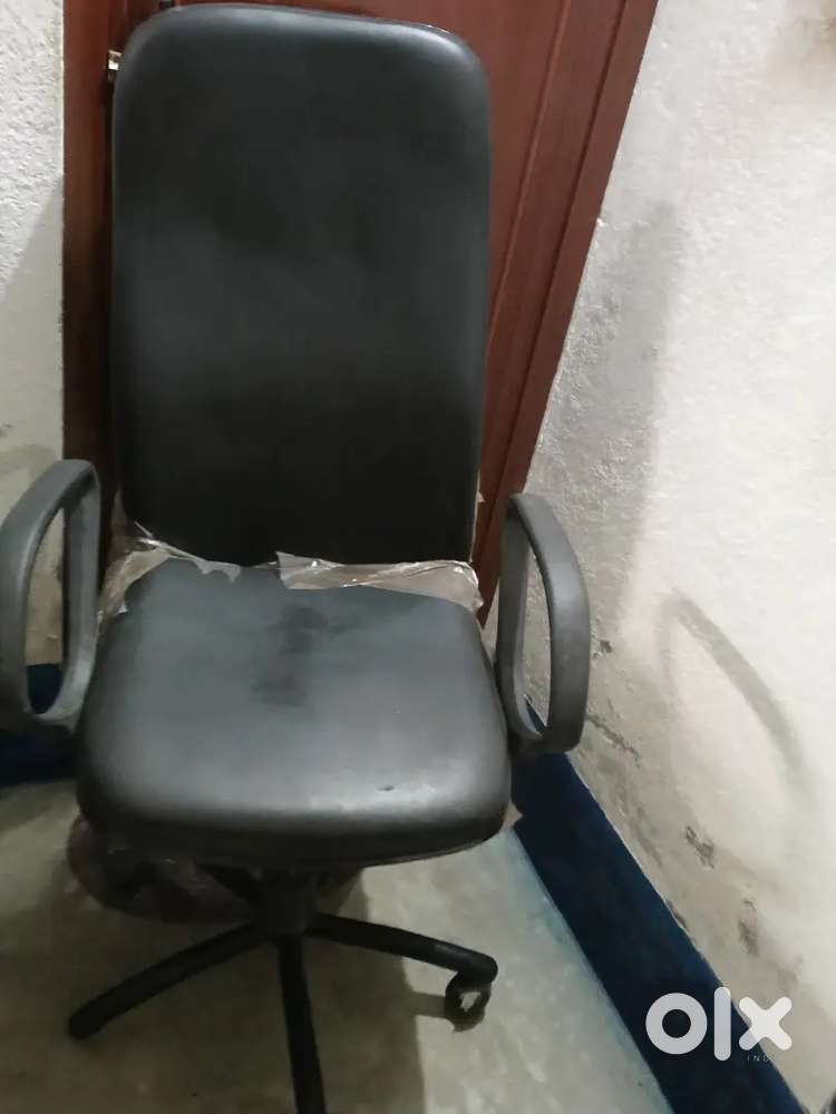 Every thing is perfect black office chair with wheels.