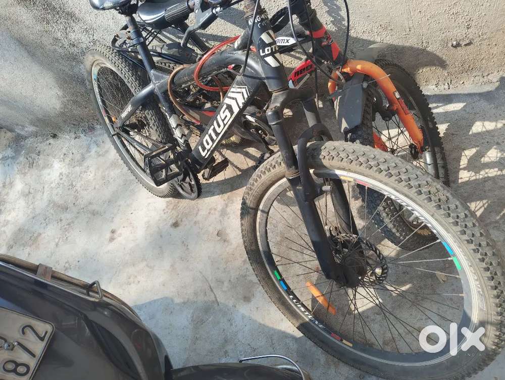 The cycle best modle brand name  lotus black and orange color cycle